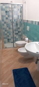 a bathroom with two sinks and a shower at B&B Iris in Conca dei Marini +25 photos