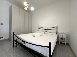 Кровать или кровати в номере Casa Viola - San Remo