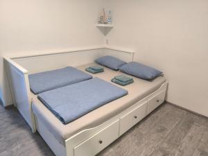 Postel nebo postele na pokoji v ubytování Apartment Eva