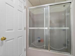 a glass window in a room with a door at Fawn Hollow Retreat, King bed, game room, BBQ  +25 photos