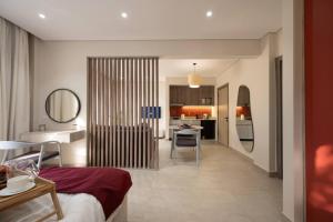 a hotel room with a bed and a kitchen at Luxury stay at a great price 88 by Spacey #71 in Cairo