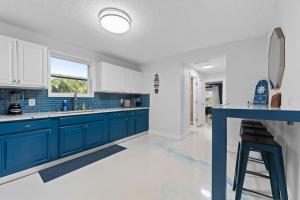 Køkken eller tekøkken på Pool Paradise - Gym, Sauna, Bar + 39 billeder