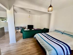 En eller flere senge i et værelse på Gizmo's Garden Cottage