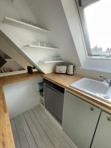 Η κουζίνα ή μικρή κουζίνα στο Le nid perché de Metz