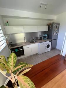 Dapur atau dapur kecil di Appartement cosy avec piscine