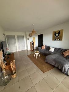 Katil atau katil-katil dalam bilik di Appartement cosy avec piscine