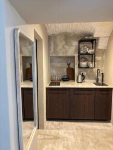 Η κουζίνα ή μικρή κουζίνα στο Vida's homes +16 φωτογραφίες