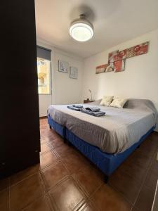 a bedroom with a bed in a room at Apartmento completo en Nueva Córdoba Argentina in Cordoba +11 photos