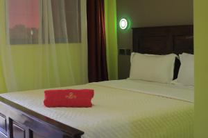 Katil atau katil-katil dalam bilik di Golden Suites Hotel