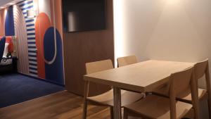 Гостиная зона в Holiday Inn Express & Suites Lisbon - Príncipe Real by IHG