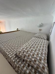 a bedroom with a bed in a room at Cozy Escape Porta Romana in Milan