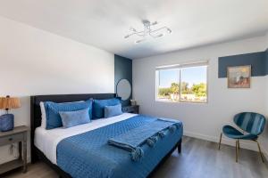 Ένα ή περισσότερα κρεβάτια σε δωμάτιο στο The Element - Pickle Ball, Mini Golf, Game Room +56 φωτογραφίες