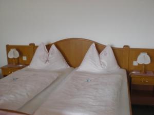 מיטה או מיטות בחדר ב-Sorli Pension