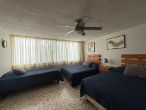 Postel nebo postele na pokoji v ubytování Mirador de Águila + 25 fotografií