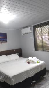 Foto de Micro casa a 8 min Rodoviária e 20 minutos Aeroporto