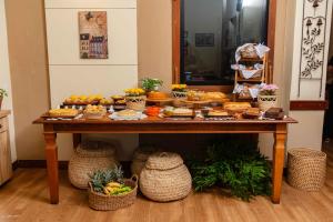 a table with appetizers and food on it at Fortmar Hotel in Fortaleza