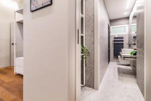 a bathroom with a toilet and a sink at luxury house - como lake in Como