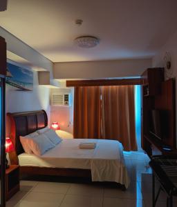 Ένα ή περισσότερα κρεβάτια σε δωμάτιο στο 18T2 Chic Corner, Horizons 101, Cebu City +14 φωτογραφίες