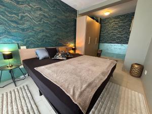 Ένα ή περισσότερα κρεβάτια σε δωμάτιο στο Casa Paradise