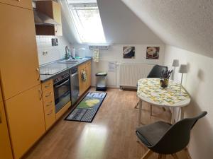 Kuchyň nebo kuchyňský kout v ubytování Ferienwohnung Luna