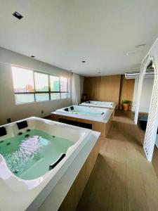Ảnh trong thư viện ảnh của UNU Art Studio Armação: piscina, academia, e + ở Salvador