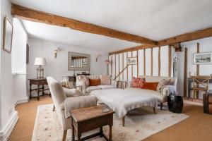 Ένα ή περισσότερα κρεβάτια σε δωμάτιο στο Spring Cottage