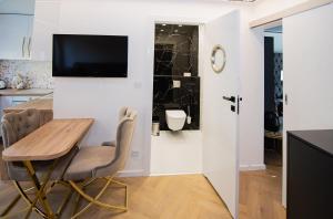Η κουζίνα ή μικρή κουζίνα στο Apartament Polaris +5 φωτογραφίες