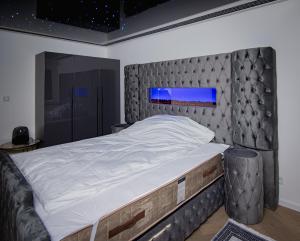 Ένα ή περισσότερα κρεβάτια σε δωμάτιο στο Apartament Polaris