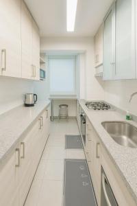 Køkken eller tekøkken på Las Condes familiar Deluxe