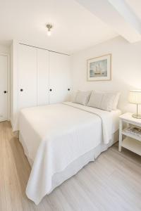 En eller flere senge i et værelse på Las Condes familiar Deluxe + 5 billeder