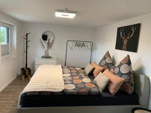 Ένα ή περισσότερα κρεβάτια σε δωμάτιο στο Gartenchalet Dinkelsbühl