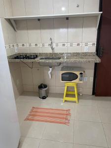 Η κουζίνα ή μικρή κουζίνα στο Flat lado mar