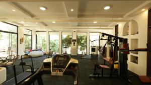 a living room with a gym with a treadmill at Zai Jardin in Fethiye