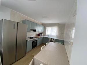 Η κουζίνα ή μικρή κουζίνα στο Ven Veranear +2 φωτογραφίες