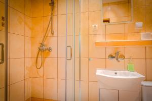 Koupelna v ubytování Słoneczna Przystań + 51 fotografií