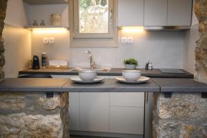 Gallery image of Omnia Apartments Amorgos Studio in Amorgos +14 photos