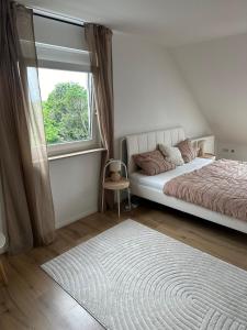Postel nebo postele na pokoji v ubytování Ferienhaus Dresdener Ausblick