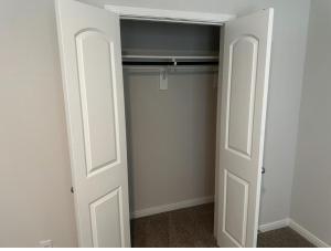 a closet with a white door and a closet at Cozy, Comfy and Relaxing! 