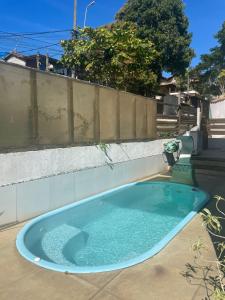 Swimmingpoolen hos eller tæt på Ape Familia c Ar e prox Praias e Centro Búzios 4p