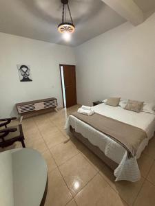 Posteľ alebo postele v izbe v ubytovaní Apartamento 102 espaçoso e tranquilo + 9 fotografií