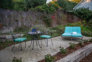 Κήπος έξω από το Summerland Stagecoach Cottage by Paradise Retreats +8 φωτογραφίες