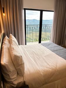 Postel nebo postele na pokoji v ubytování Gran paradiso resort Campos do jordão