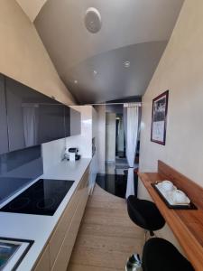 Η κουζίνα ή μικρή κουζίνα στο Suite Mille +9 φωτογραφίες