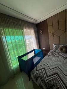 Tempat tidur dalam kamar di Apartamento moderno con wifi y parking gratis