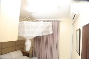 Fotografie z fotogalerie ubytování Lovely 2-bedroom condo kololo, kampala v destinaci Kampala