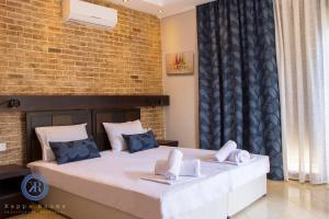 Fotografie z fotogalerie ubytování Kappa Rooms by BookVillaEU v destinaci Nea Kallikratia + 10 fotografií