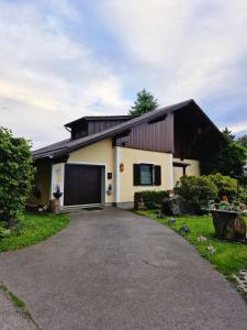a house with a driveway in front of it at Feriendomizil 219 in Allerheiligen bei Wildon