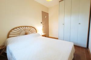Postelja oz. postelje v sobi nastanitve Bright cocoon with shared pool in Bandol