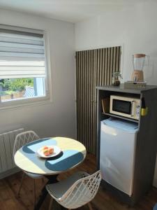 Dapur atau dapur kecil di Appart cosy num 4 parking zen