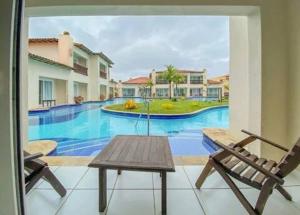 Bazén v ubytování Suíte aconchegante vista jardim nebo v jeho okolí + 7 fotografií